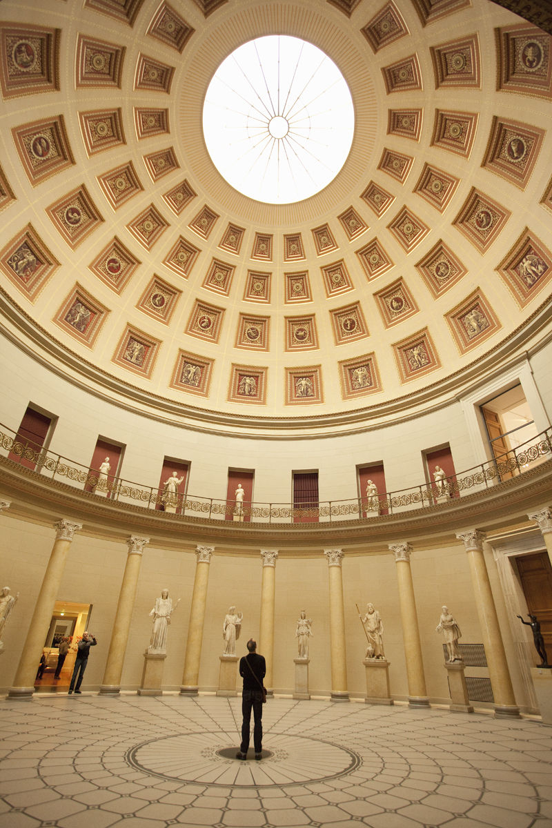 Alte Nationalgalerie (Old National Gallery) 1861, Museum Island, person standing and viewing the rotunda entrance of the museum. Getty Images #108878265 person standing in rotunda of museum