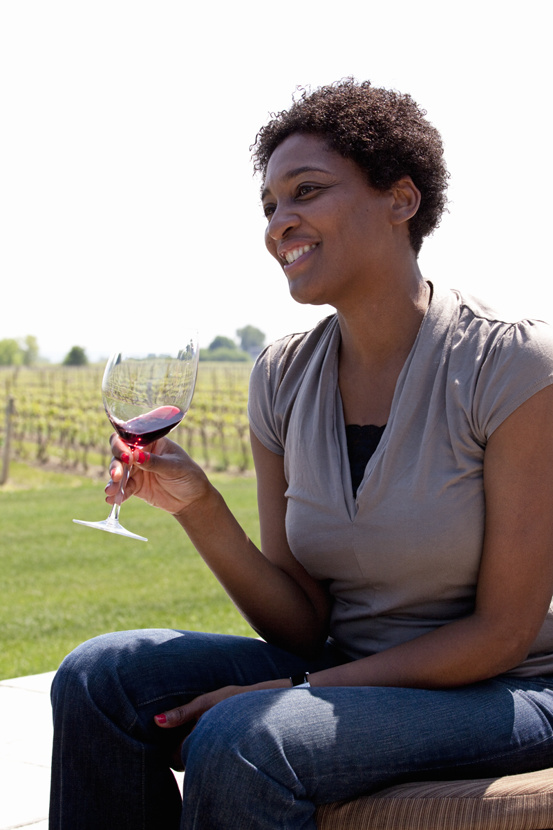 Canada,Ontario,Niagara-on-the-Lake, woman wine tasting at winery. Alamy # BN0HRH woman wine tasting at winery