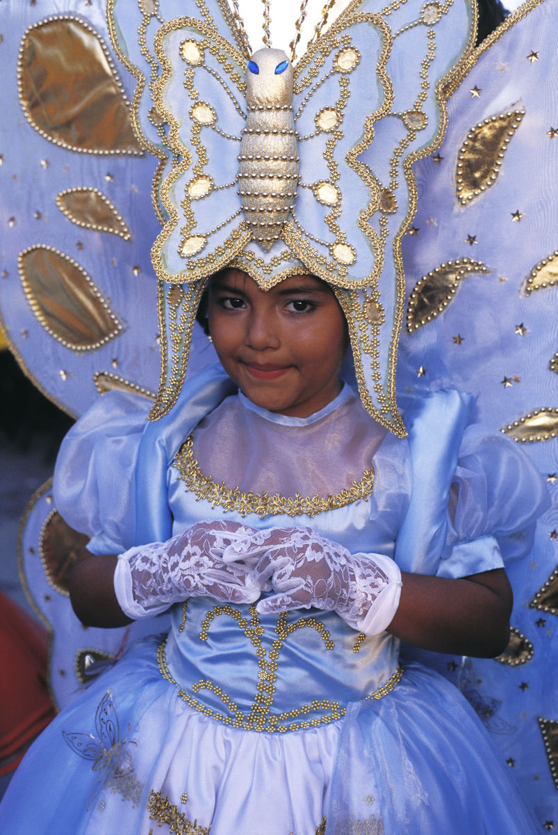 Mexico, Cozumel, Young girl dressed in butterfly costume for a Rite of Spring celebration. Alamy #A04662 Young girl dressed in butterfly costume for a Rite of Spring cel