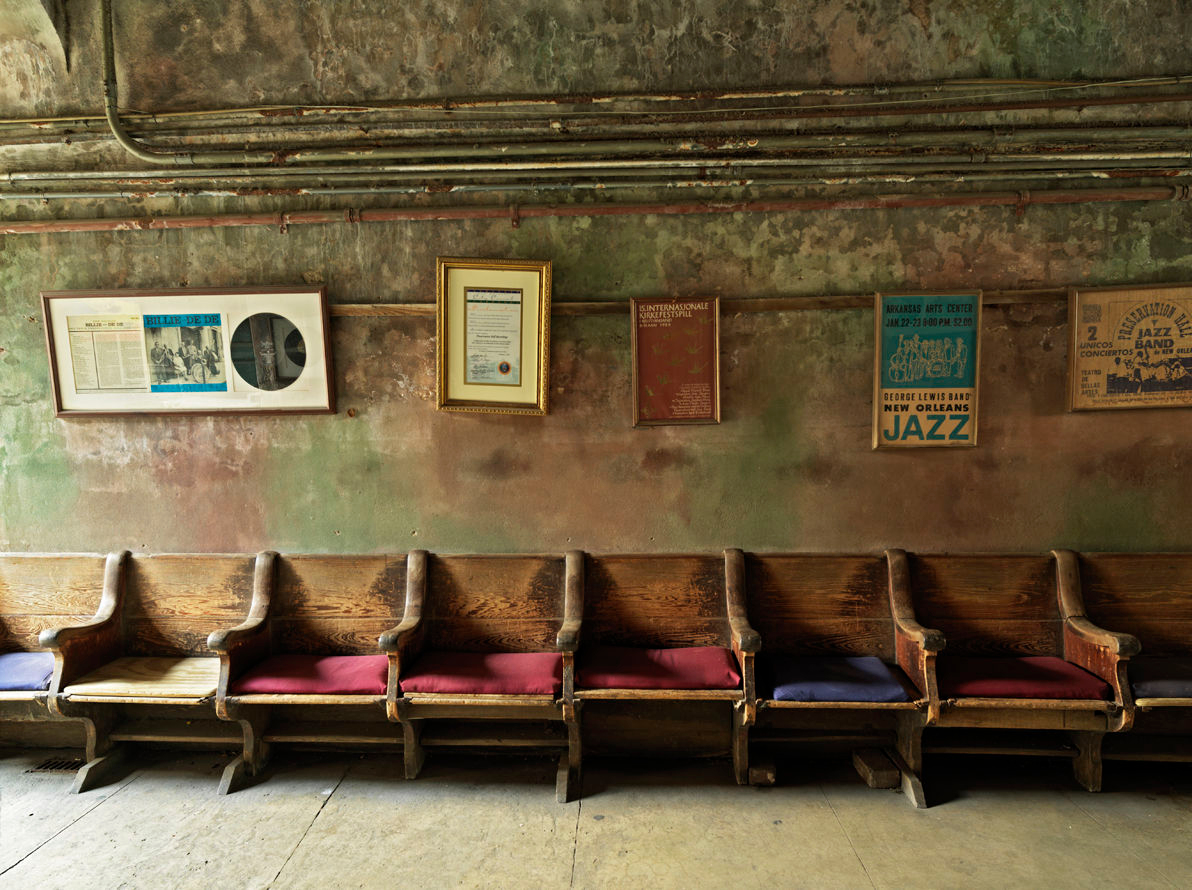 USA Louisiana New Orleans French Quarter,Preservation Hall,wooden bench seating against a wall Preservation Hall,wooden bench seating against a wall