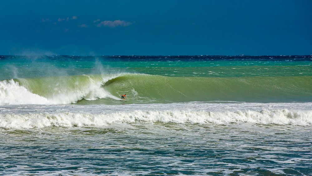 hurricane_sandy_shoreline_surfer.jpg