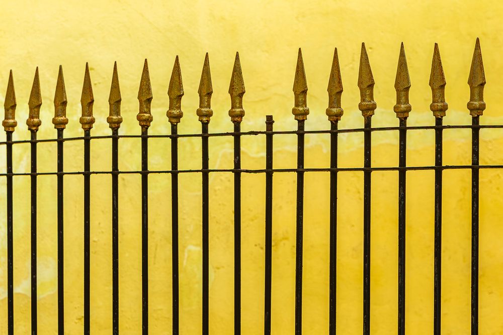 cuba_street_spear_fence_yellow_wall.jpg