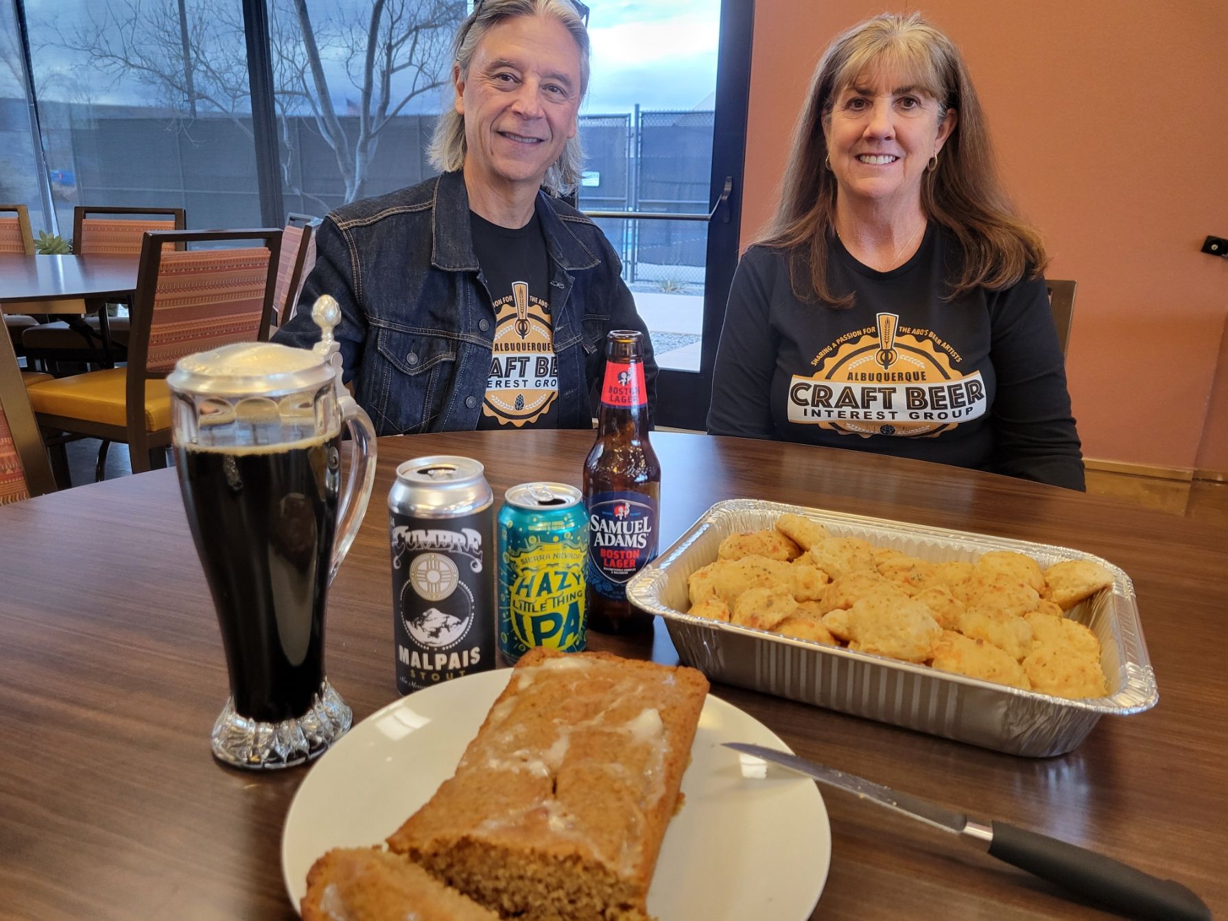 Dan and Karen Garcia show their club t-shirts.jpg