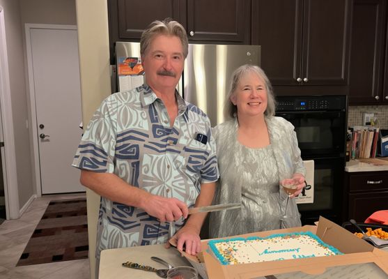 Ron and Sheila cutting their cake Ron and Sheila.jpg