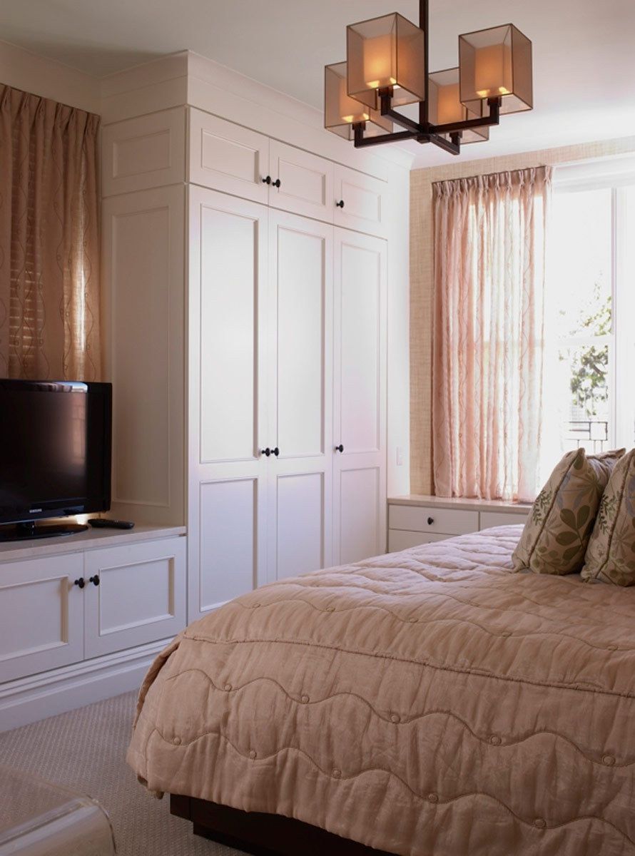 This exceptional example of a classic six room prewar apartment was carefully designed to fulfill the needs of a young and growing family.  Cabinetry and moldings were detailed to respect the traditionally proportioned rooms, but bright glass and stone tiles were chosen for the kitchen backsplash and bathroom floors to bring a note of modernity to the palette.  This apartment has fully integrated electronic systems for music, television, telephone and computers. Classic Six on the Upper West Side