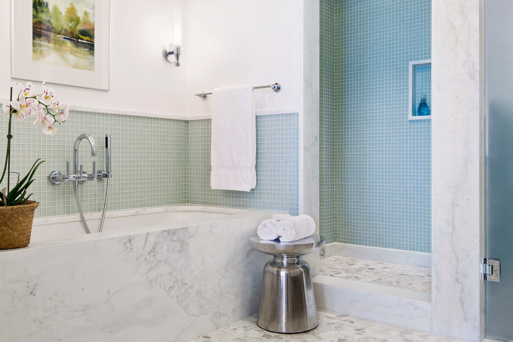 This oceanfront condominium was stripped to its concrete structure, and recreated with a new plan of three discreet zones: public rooms, master suite and guest quarters.  The public spaces flow together seamlessly for easy entertaining and maximum ocean exposure.  The cook's kitchen is outfitted for every possible need, and the matte glass wall tiles and marble rock floors in the bathrooms evoke beach glass glistening in the sand.Custom silk area rugs and Pierre Frey fabric curtains and upholstered furnishings were created especially for the project.New HVAC systems and hurricane resistant doors, windows and shutters were installed.Belsey & Mahla Architects provided both architectural and interior design services on this project completed in 2014. John's Island, Florida