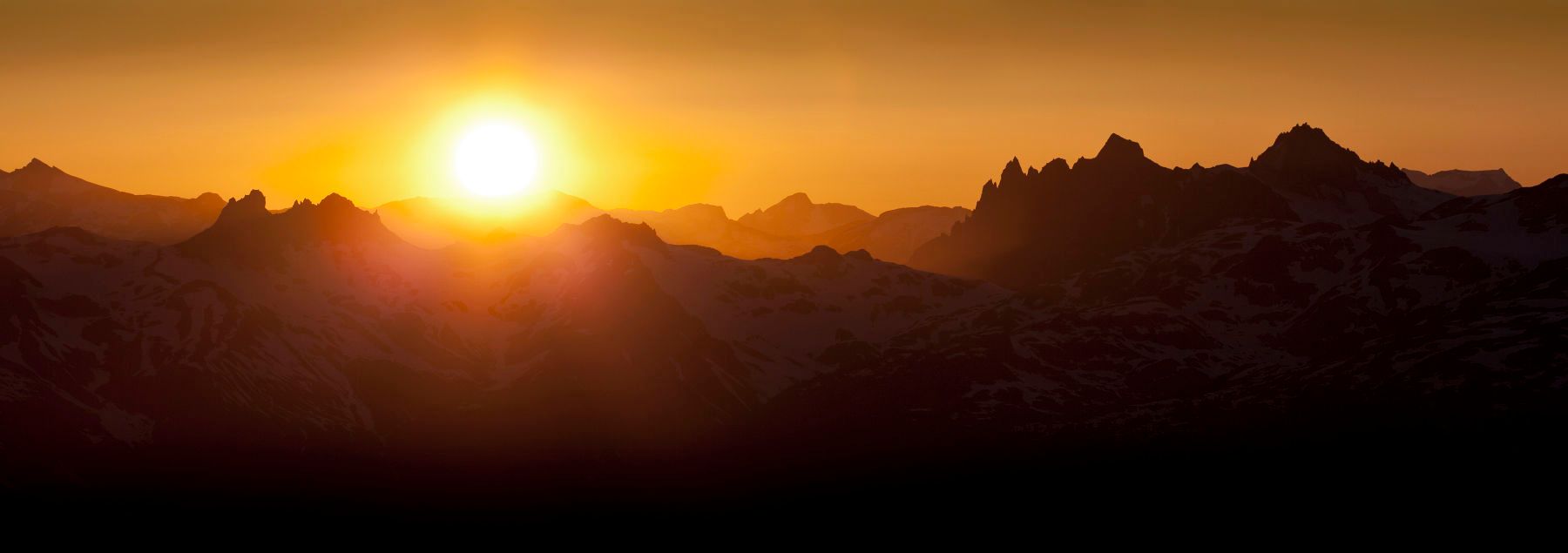 Panoramic view of sunset and western skyline from Whistler Mount