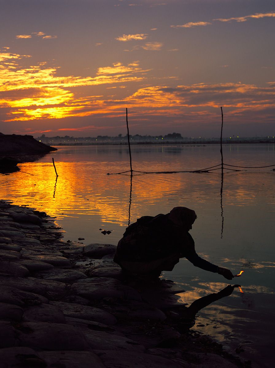Prayers on the Ganges at sundown, Allahabad