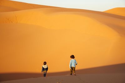 Playing in the dunes of Erg Chebbi, Morocco