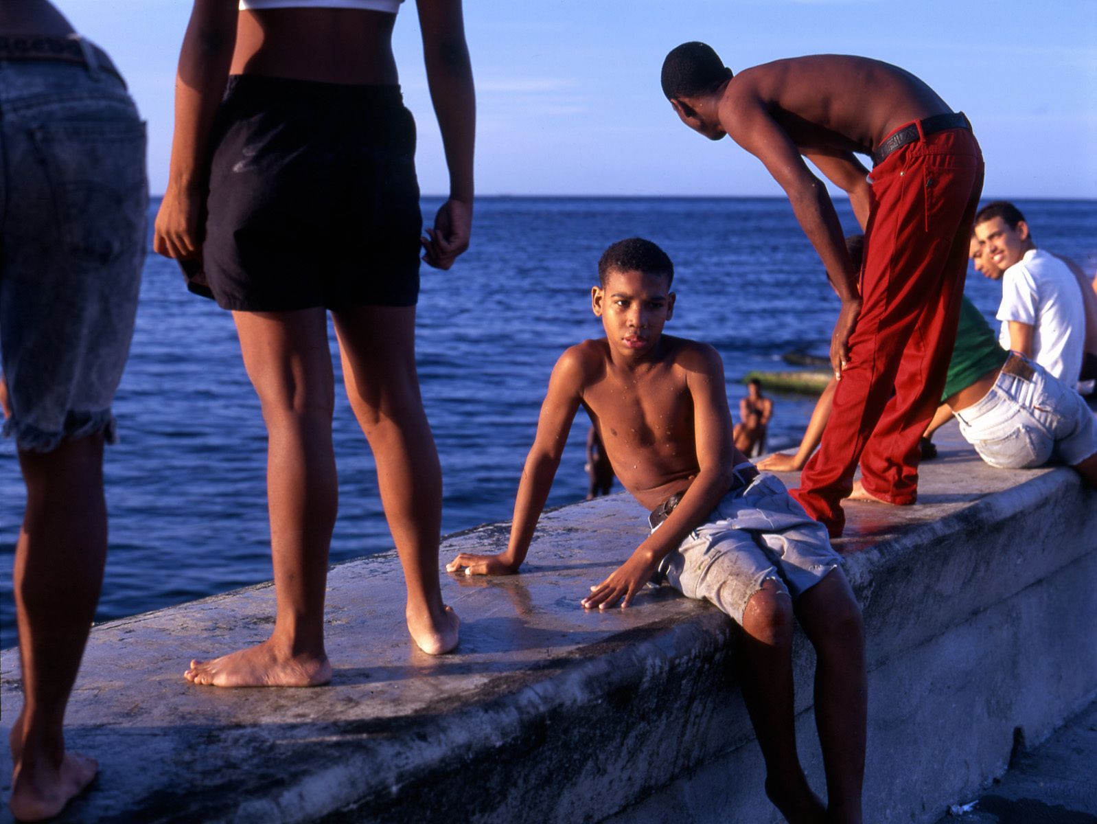 Kids Jumping off seawall on the Malecon
