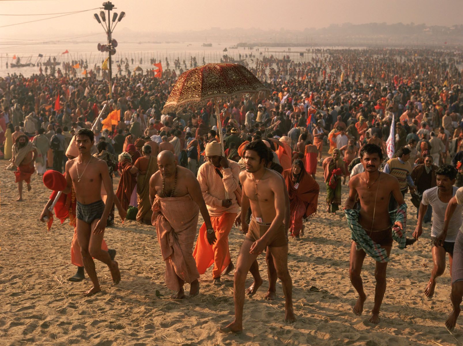 Returning from bathing in the Ganges, Kumbh Mela