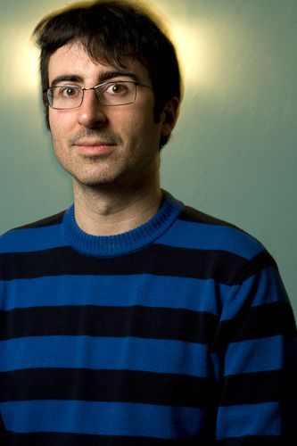 Portrait of comic John Oliver by photographer Dan Dion. John Oliver