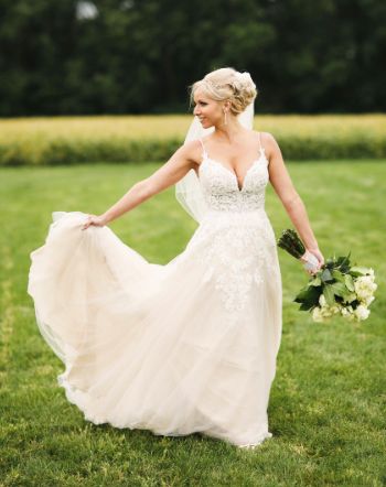 Bride Holding Dress - CampBride