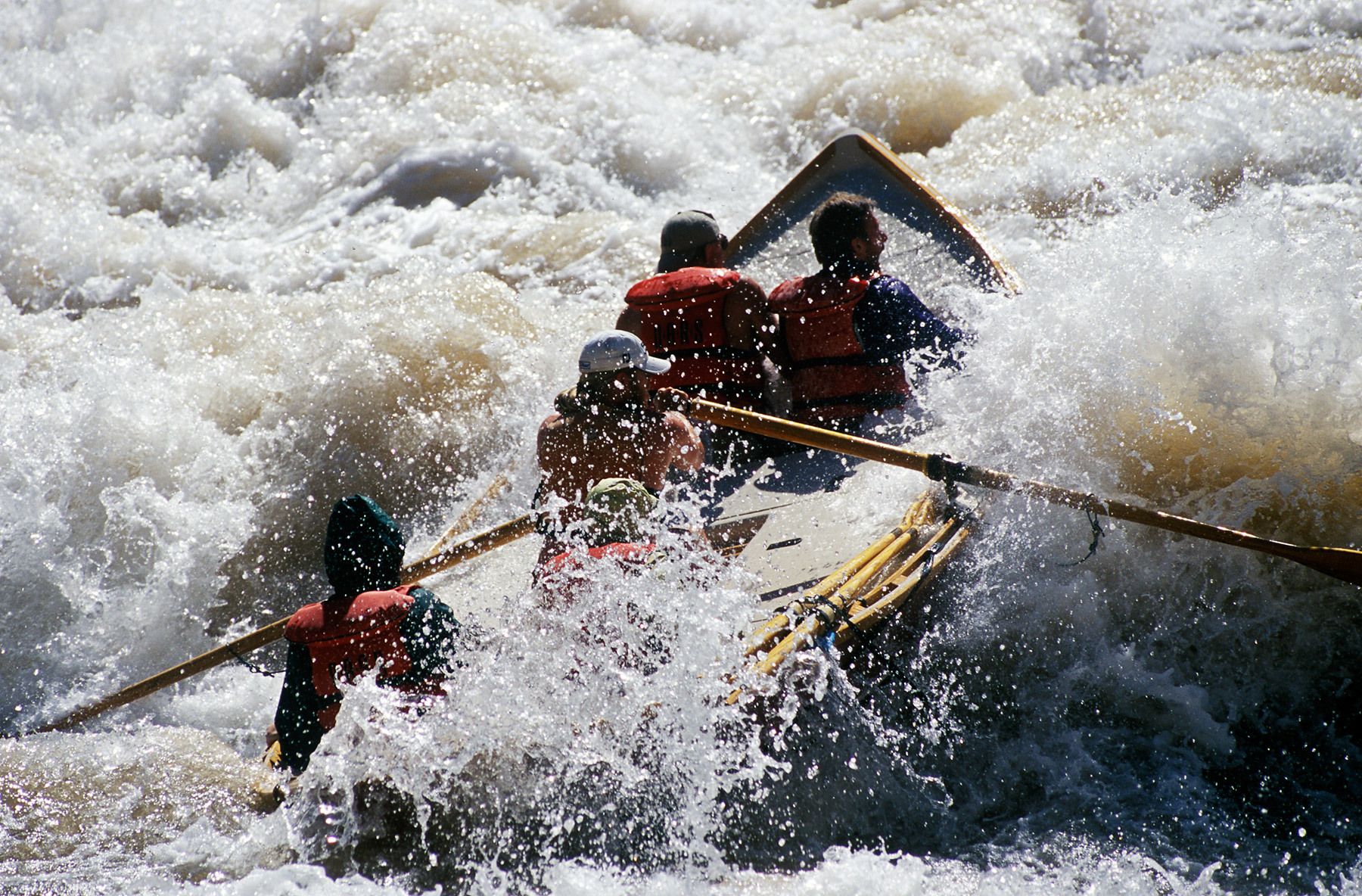 Whitewater dory engulfed in the turbulent water of Lava Falls, Grand Canyon