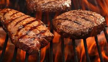 Dinner Food Photography-Steak and Burgers on Flaming Grill