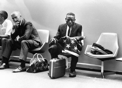 Grieving Man with Flag, Washington, DC, 1971