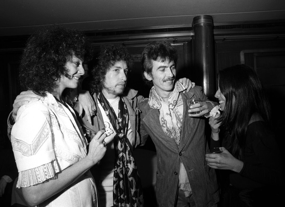 George Harrison & Olivia and Bob Dylan & Sara, Wing’s party, 1975