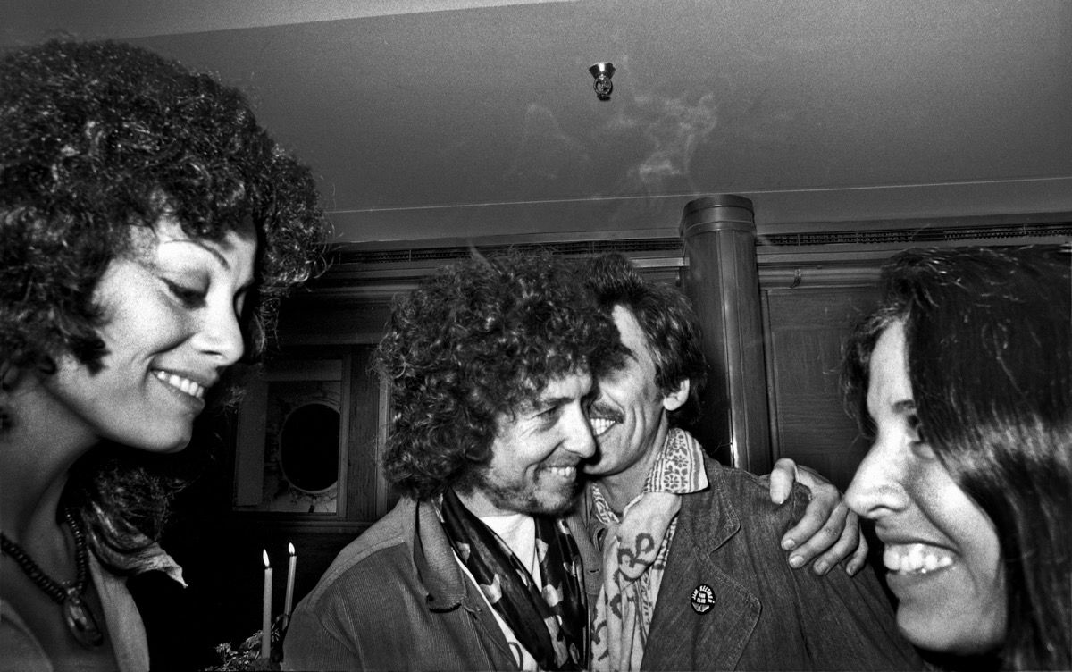 George Harrison & Olivia and Bob Dylan & Sara, Wing’s party, 1975