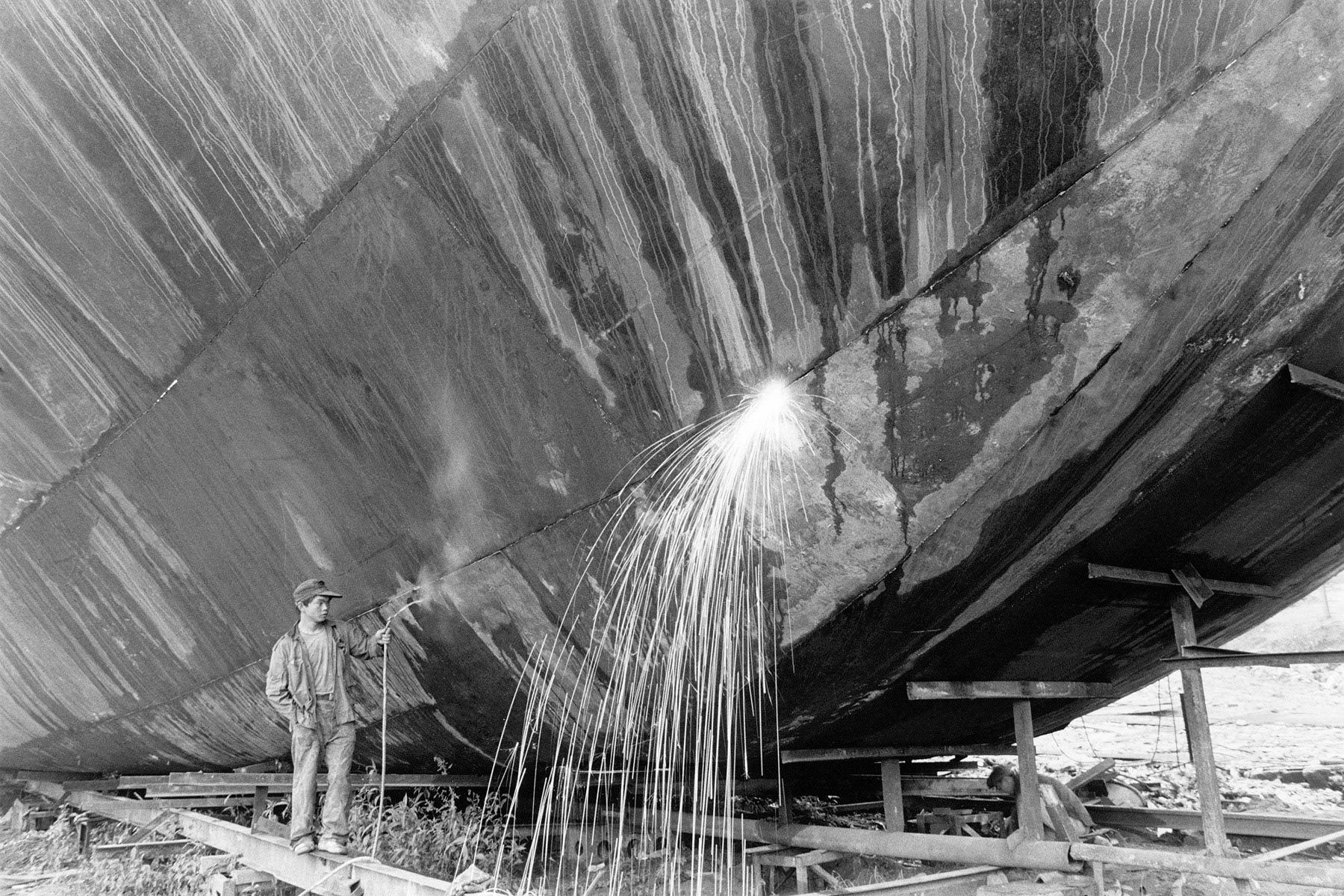 Welder's Assistant, Li Dou, China 1999
