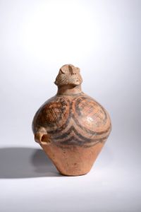 Red Pottery Jar With Human Head