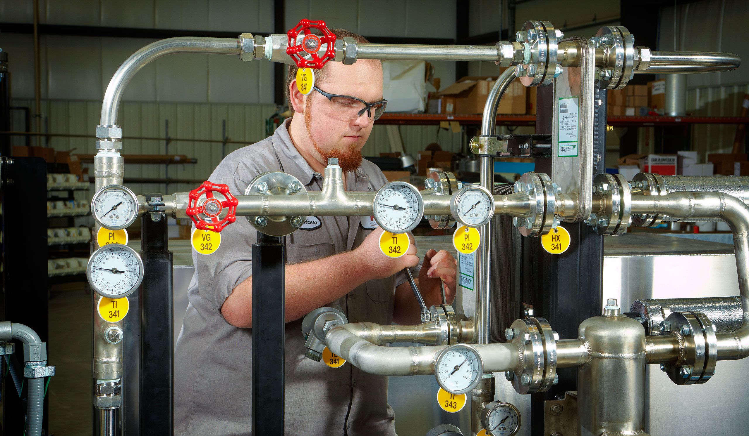 Installing gauges on biogas tanks at Unison Solutions