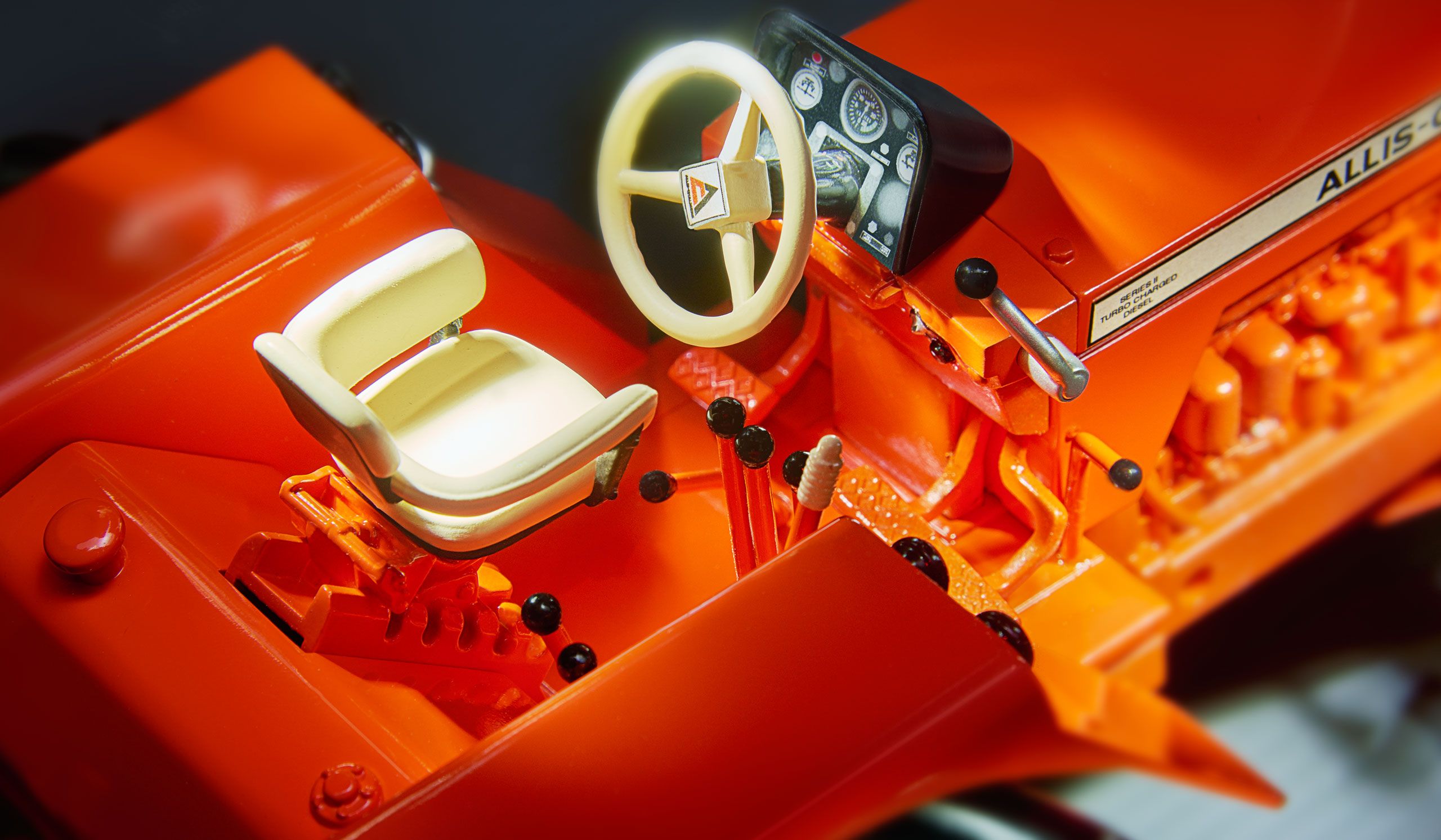 Close up of  red Toy Farmer tractor