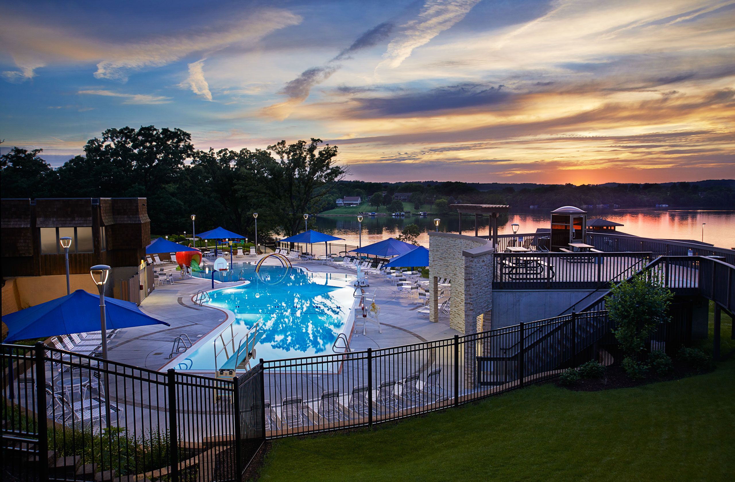 Exterior dusk swimming pool photograph