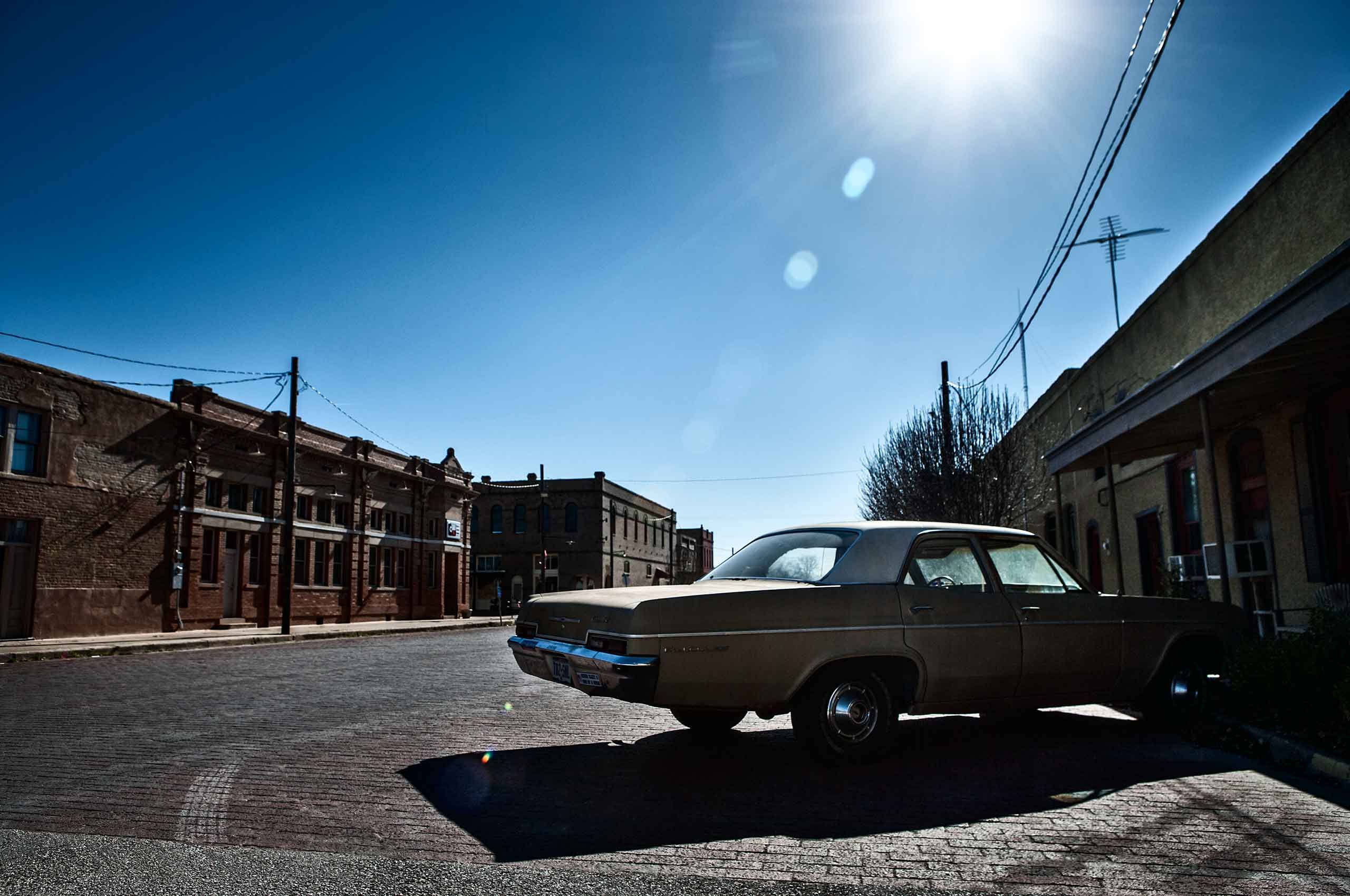 vintage-car-on-street-bartlett-texas-by-HenrikOlundPhotography.jpg