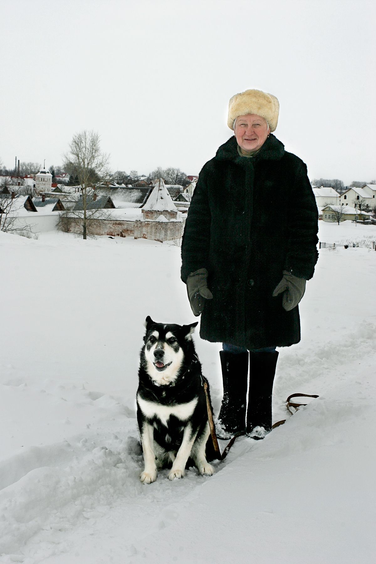 Russian Woman walking a Dog