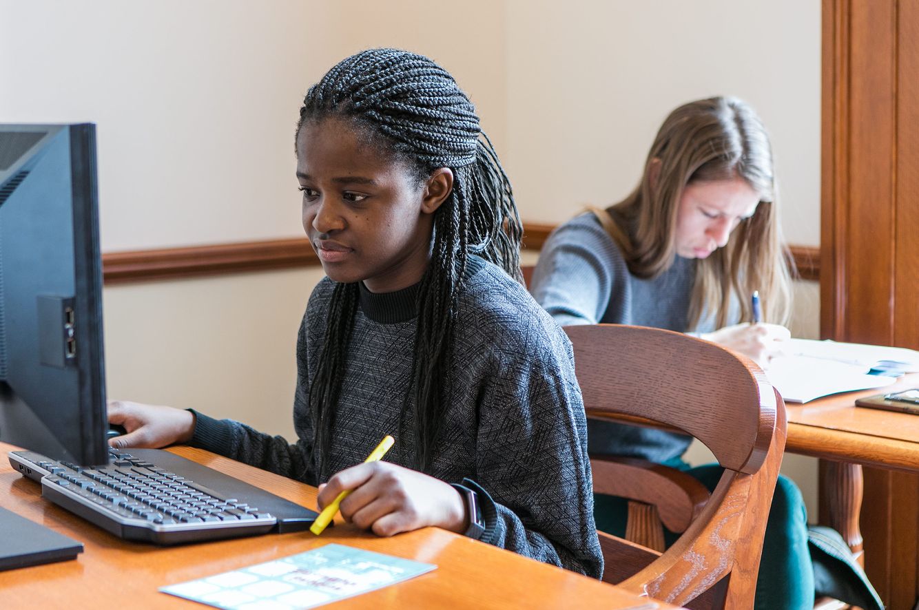 Students at the Baker Library