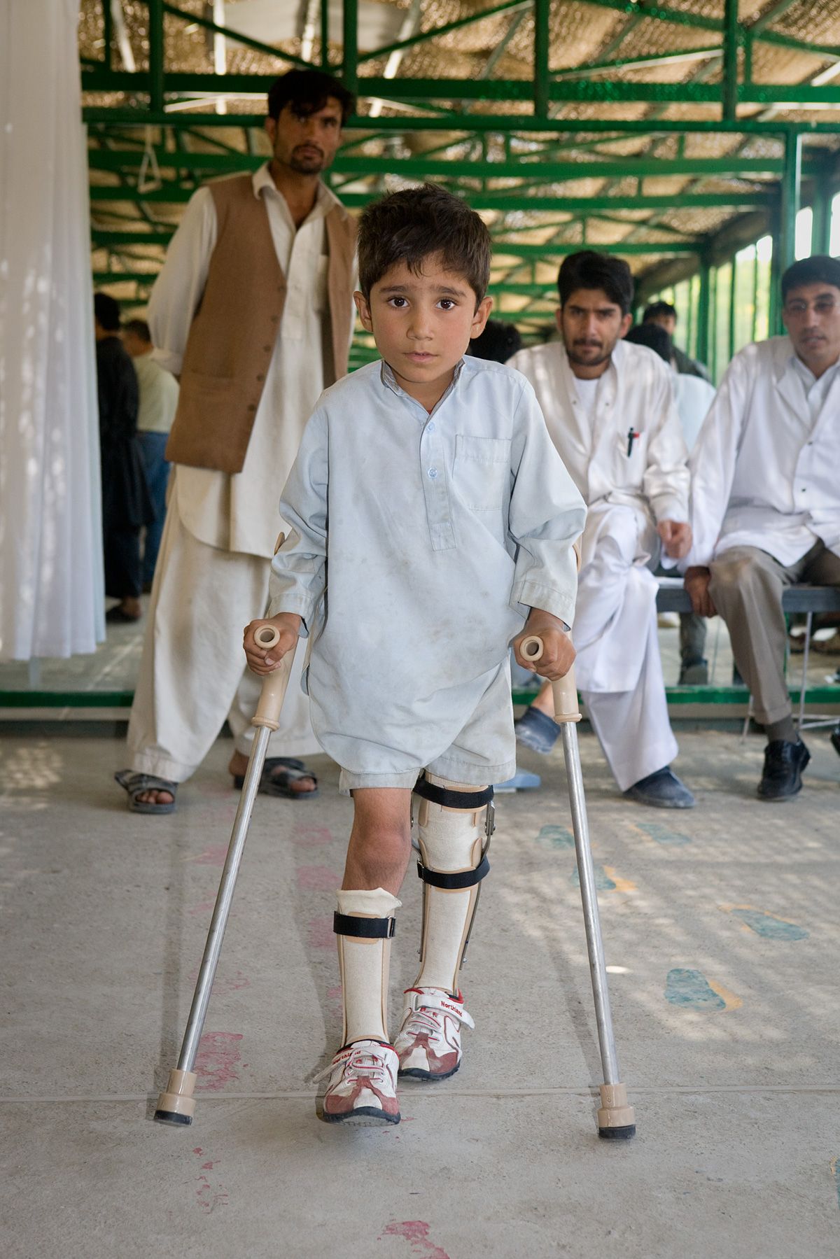 An Afghan Boy on Crutches