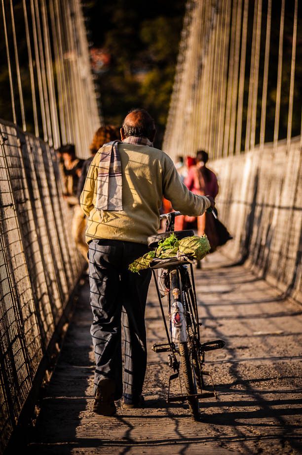 1old_man_crossing_bridge_rishikesh_india