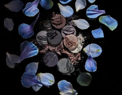 Blue, Brown and Black Makeup and Flower Composition | Product Photography | Cosmetic Styling Los Angeles