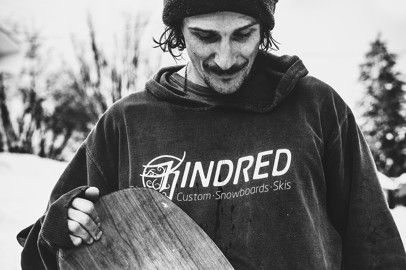 kindred sweatshirt and snowboard