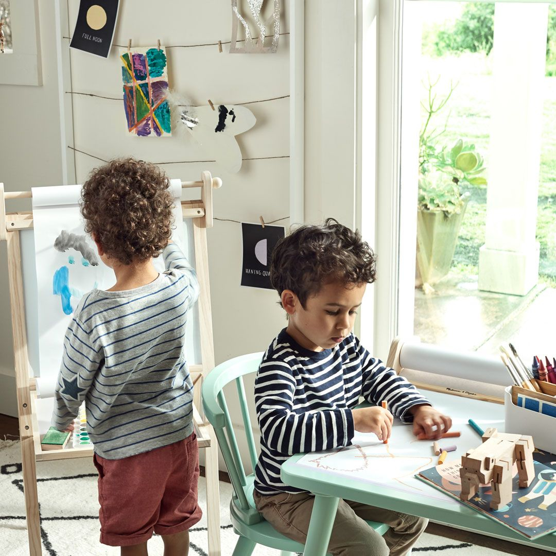 two little boys creating art