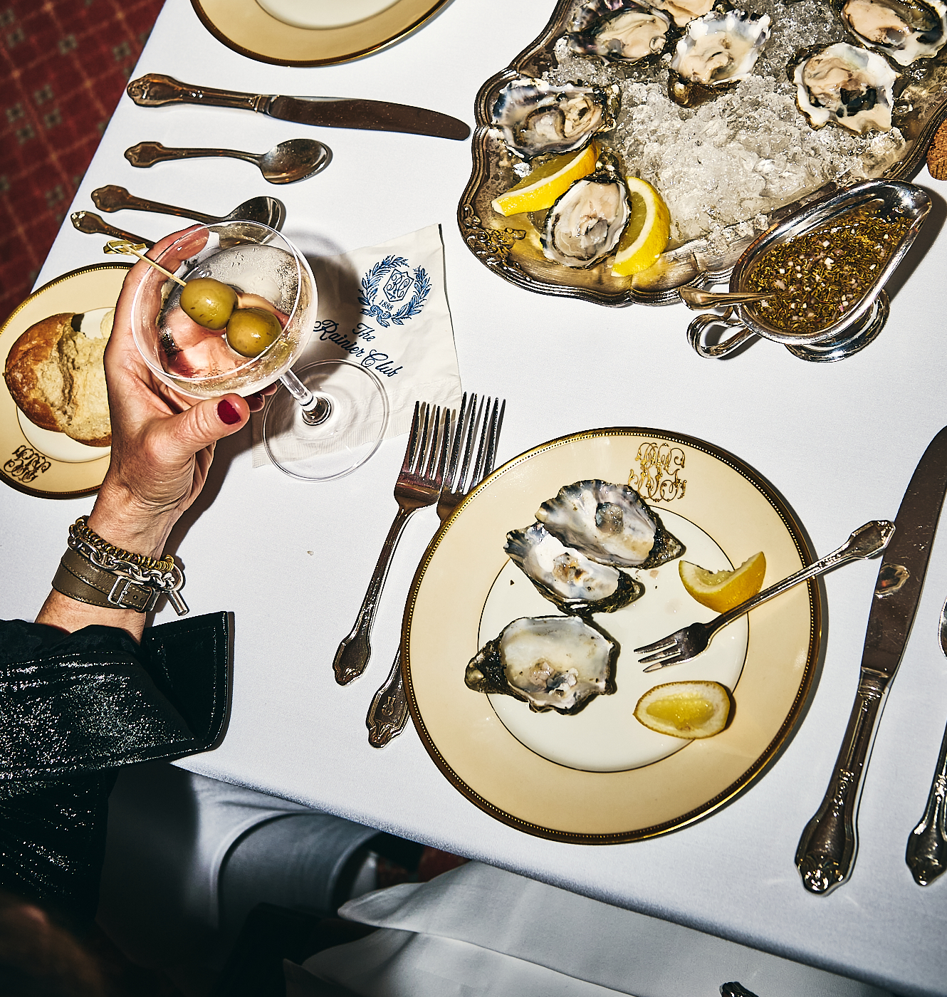 oysters and lemons on ornate plates