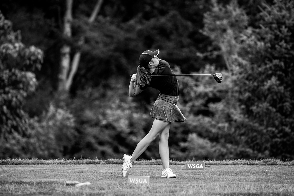 Beautiful black and white image of golfer  