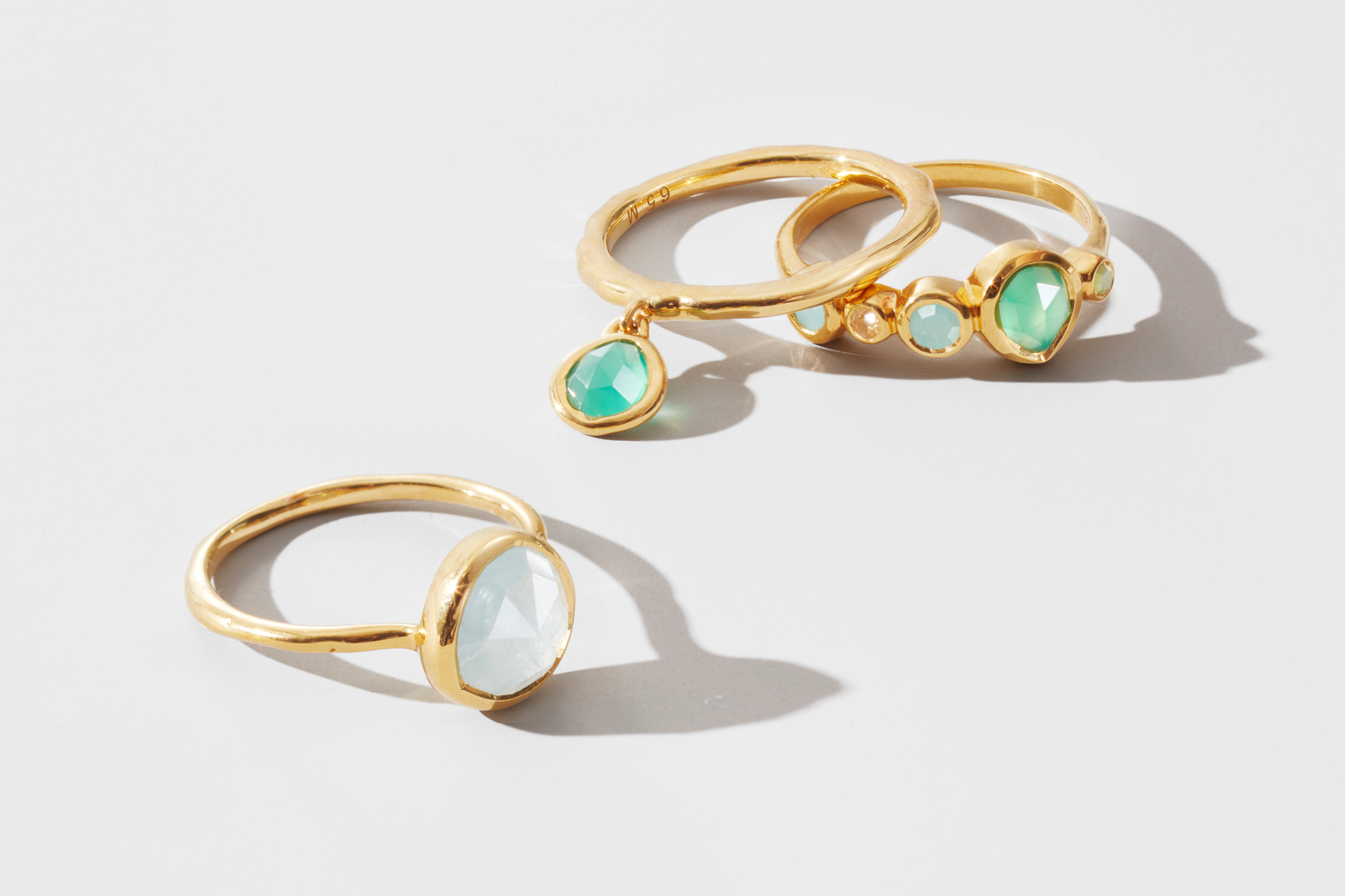 stacking rings product photography Moonstones and gold