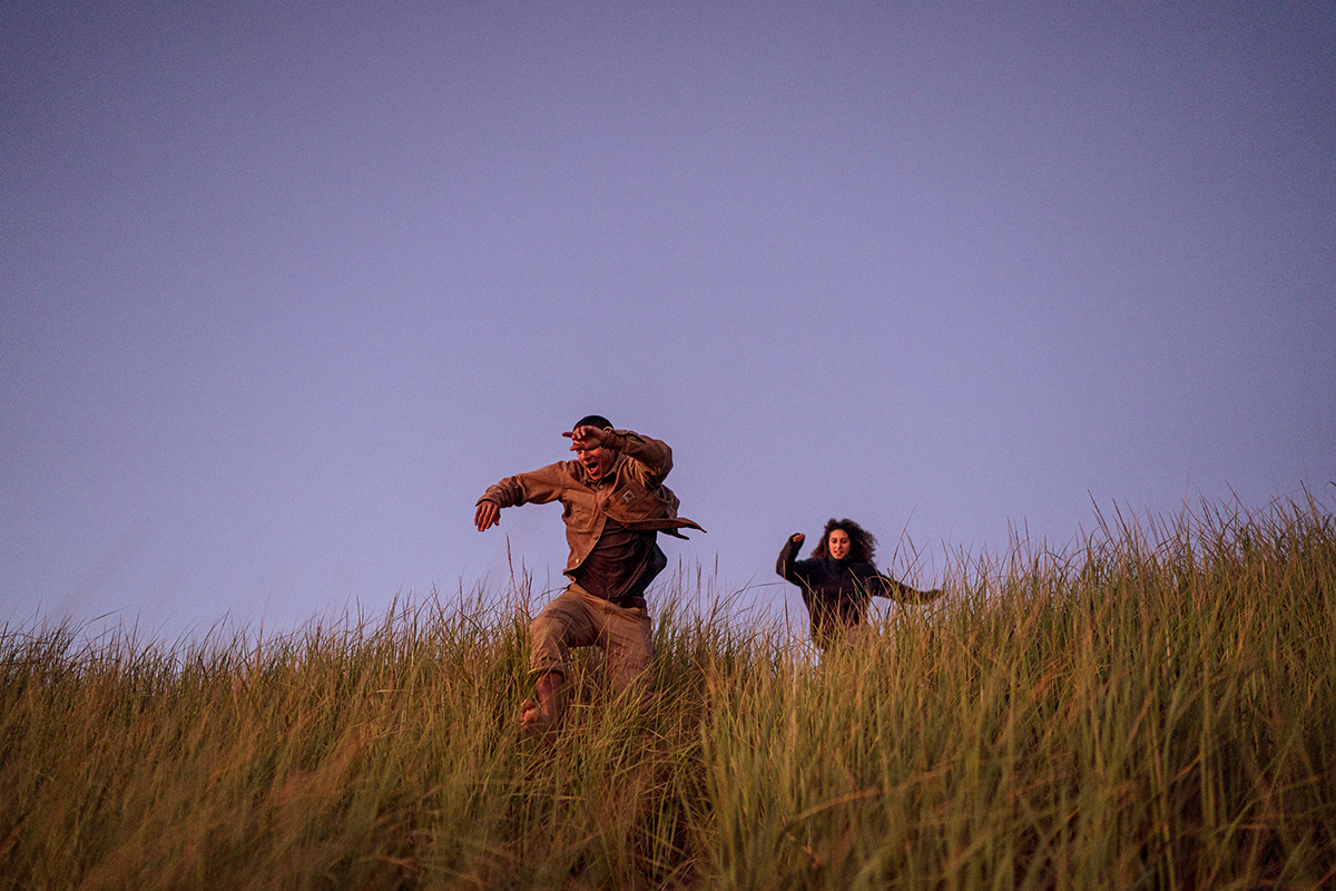 Wanderers against the purple sky