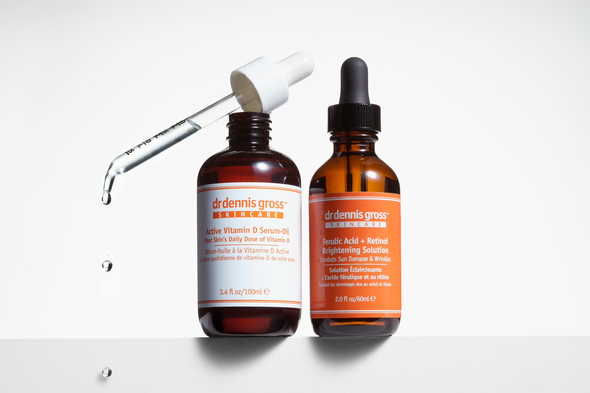 Amber bottles with Orange and White Labels  