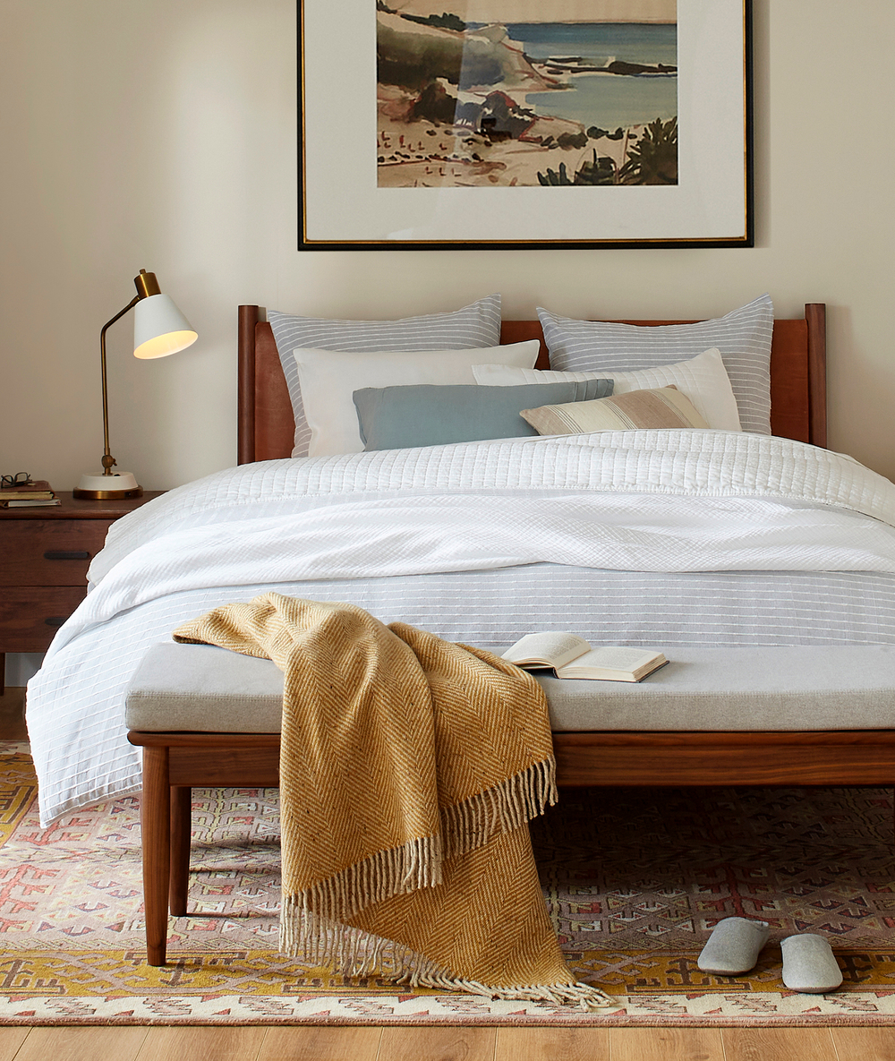 natural mid century modern bedroom with wooden elements and white linens Natural Open Bedroom