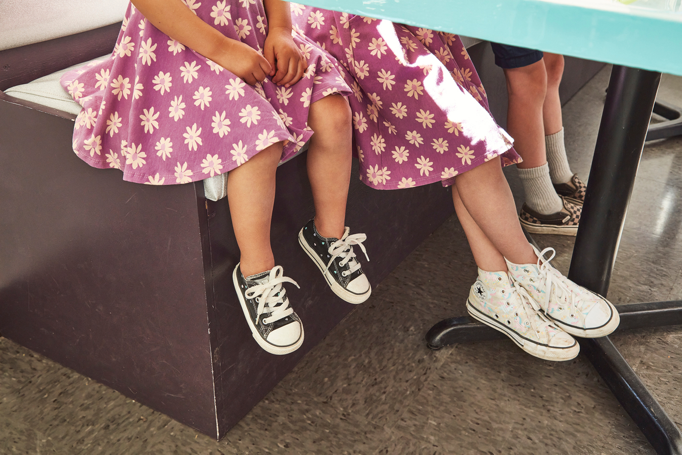 Vans and converse shoes at the diner 