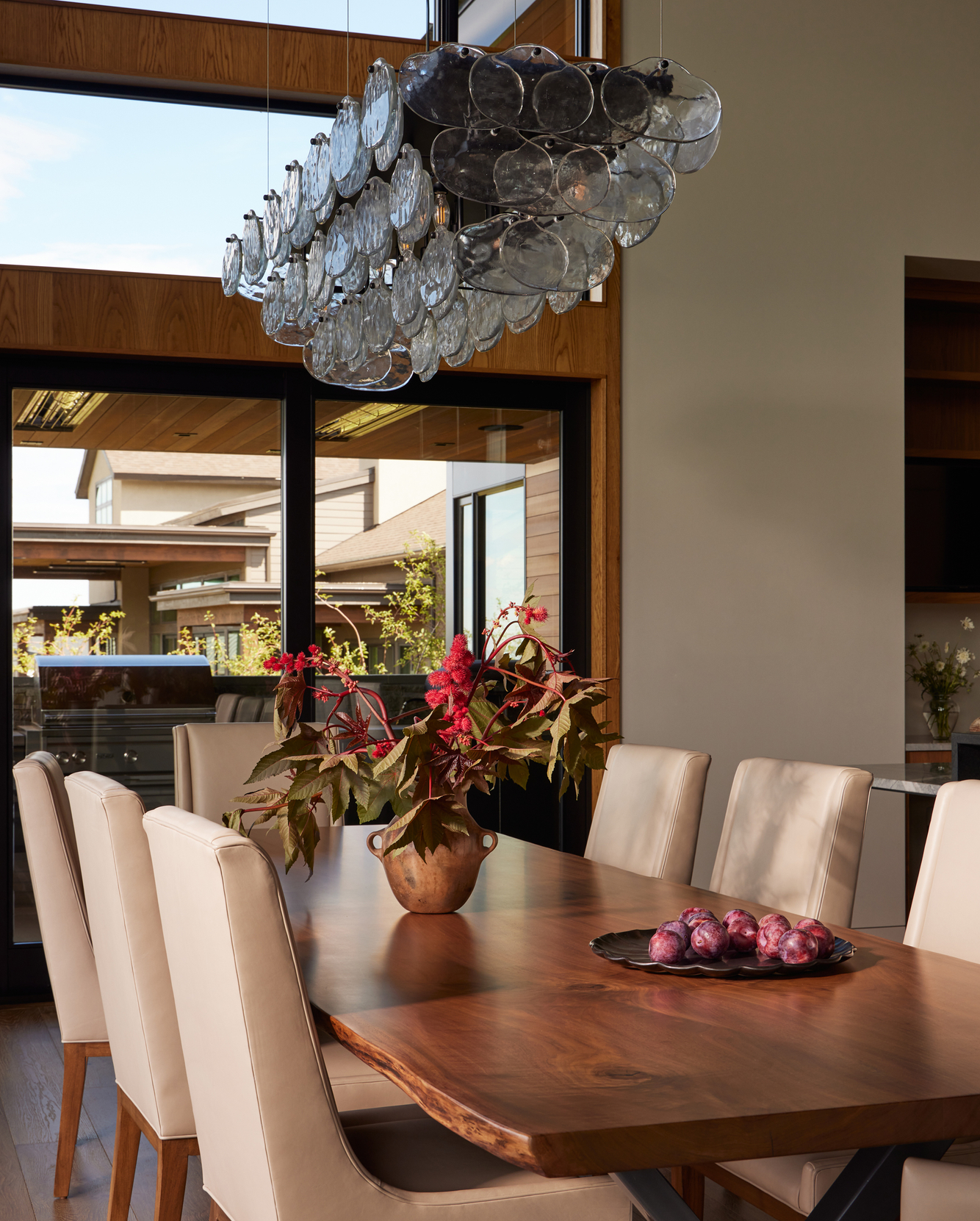 dinning room table with modern chandelier A LIGHT FILLED BEND HOME