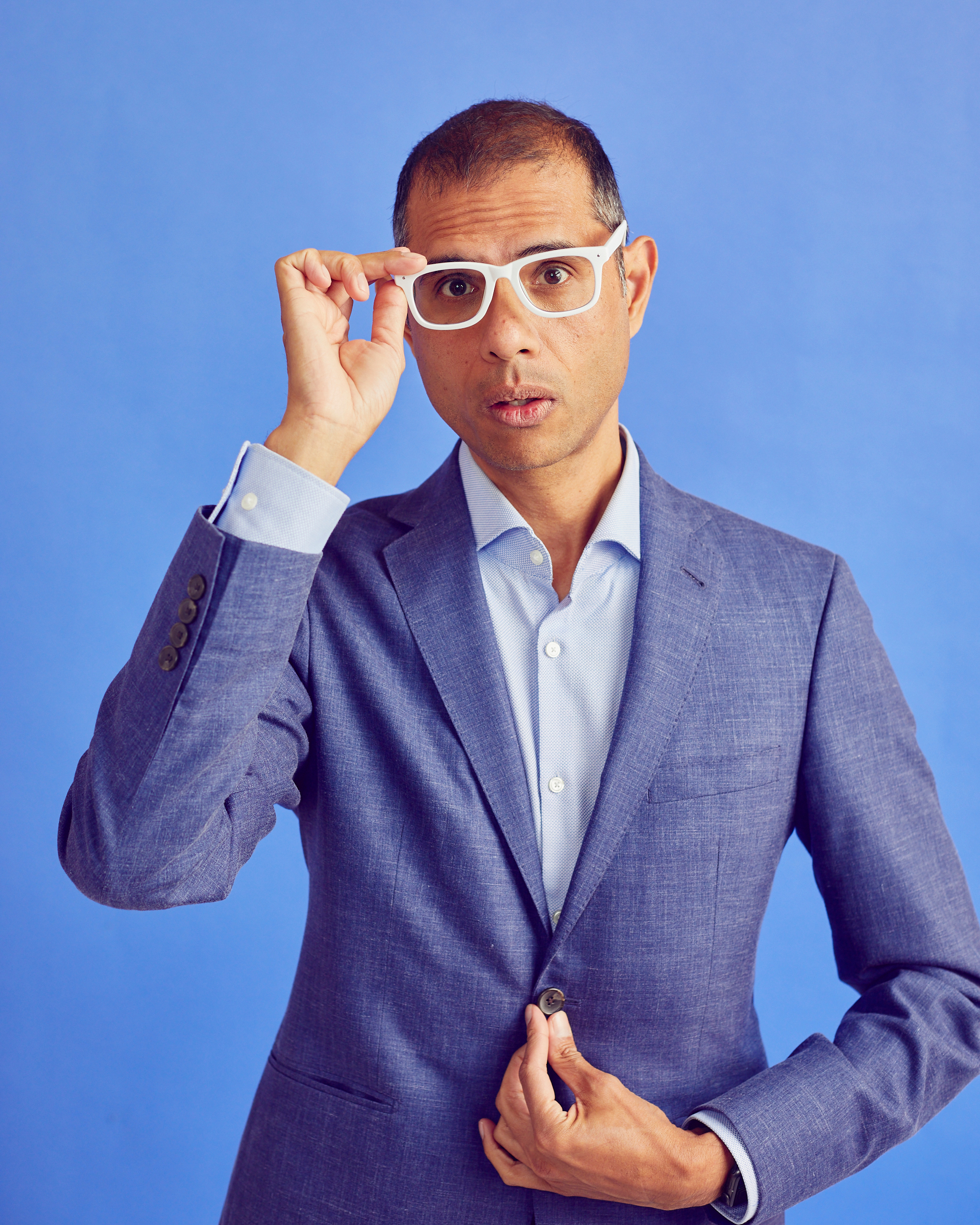 portrait of a man in a blue suit 
