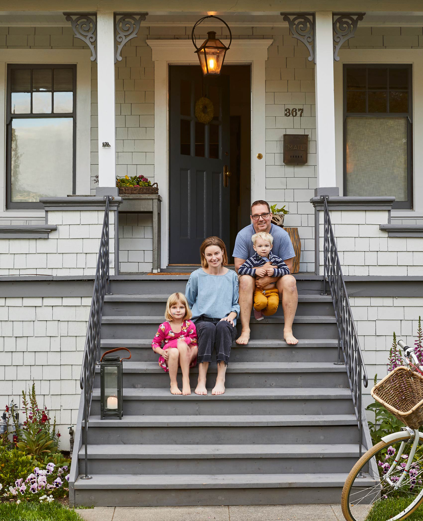 Family Sitting On Stoop of Napa House Interior Photography by George Barberis of Sally Bjornsen Represents Napa_House_Front_Steps_Stoop_33527crop.jpg