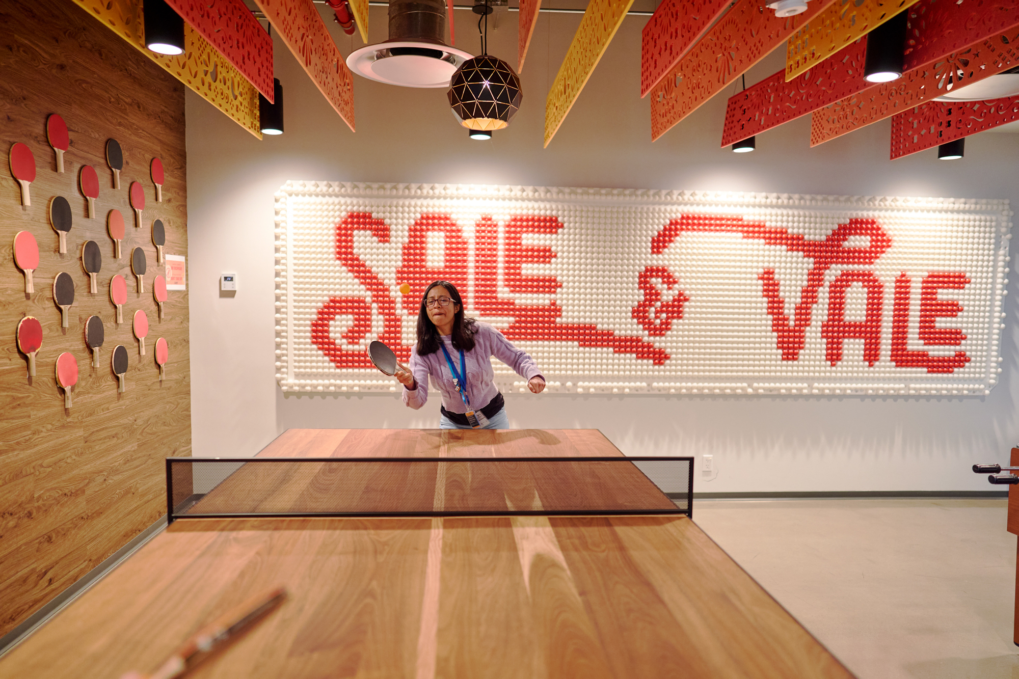 employees play ping pong at work at amazon mexico city 