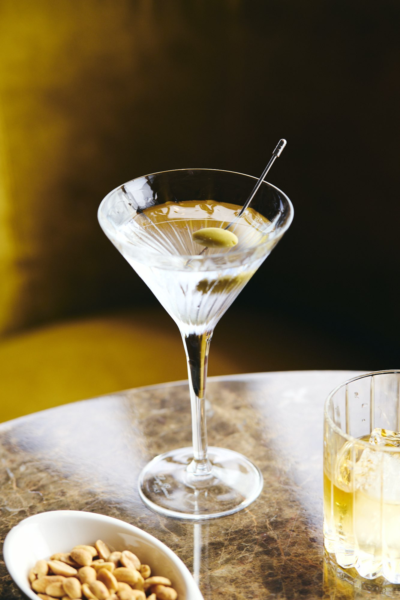 ombre golden martini with olive 