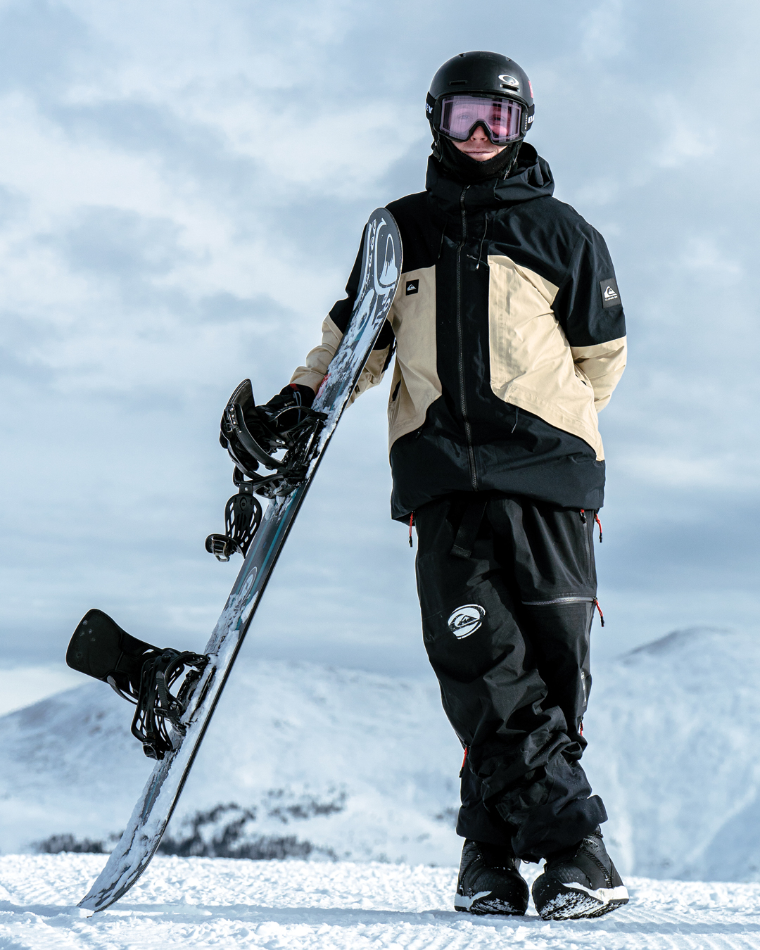 snowboarder poses for photo by Troy Nebeker