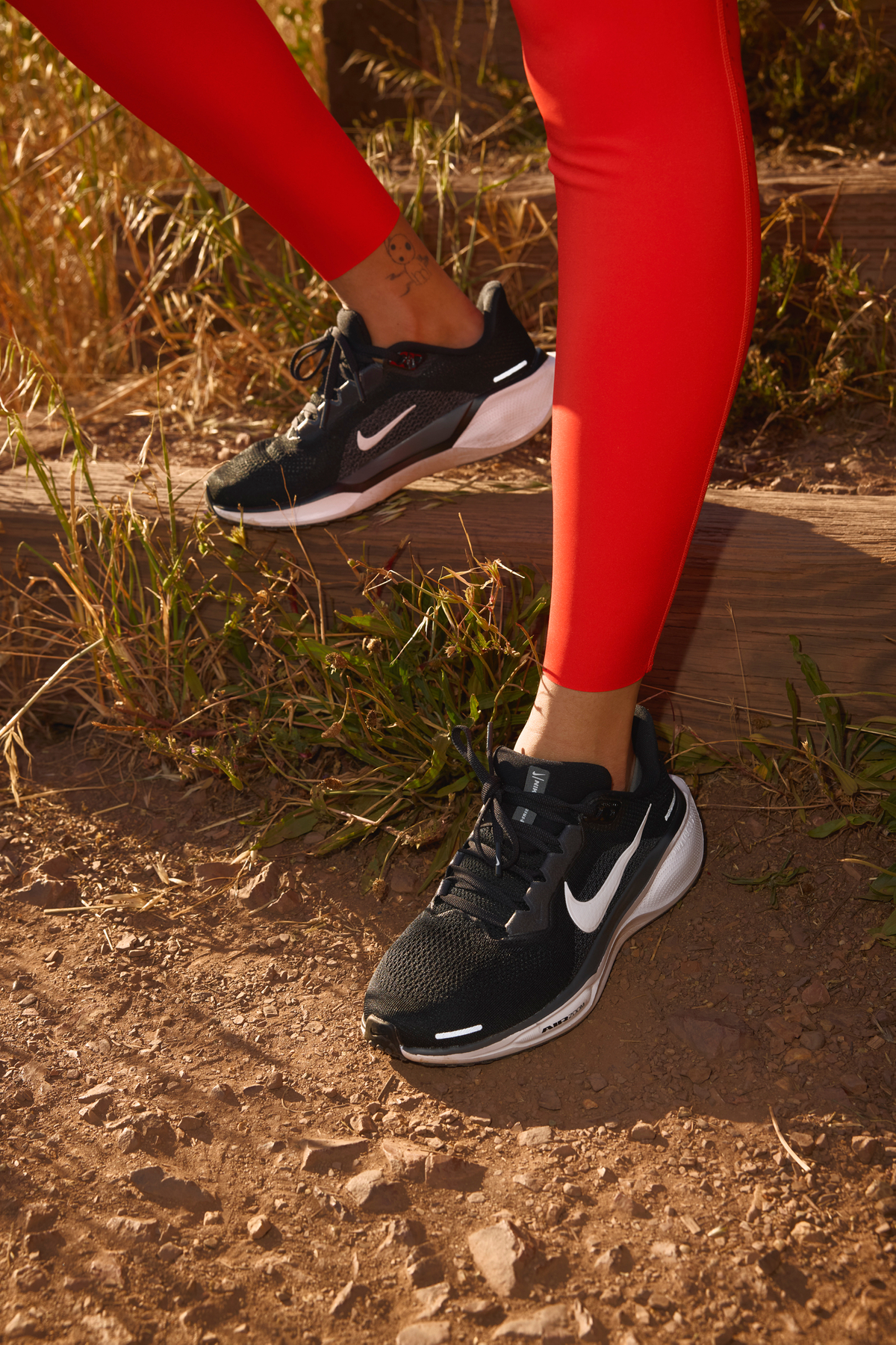 Nike Black And White Shoes With Red Leggings 
