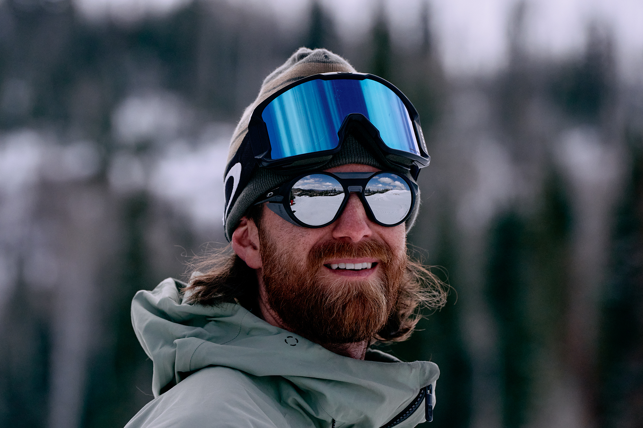 winter athletes snowboarder with double goggles